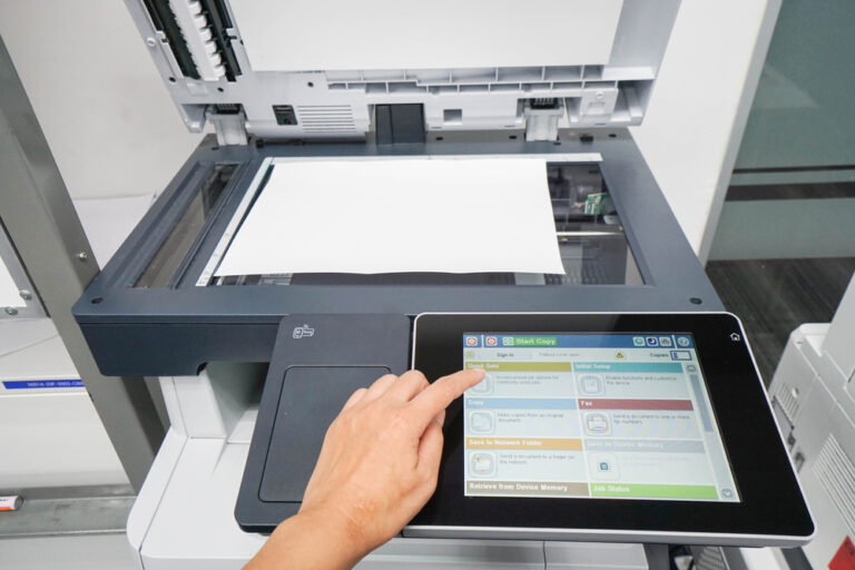 woman press set up printer before scanning business documents
